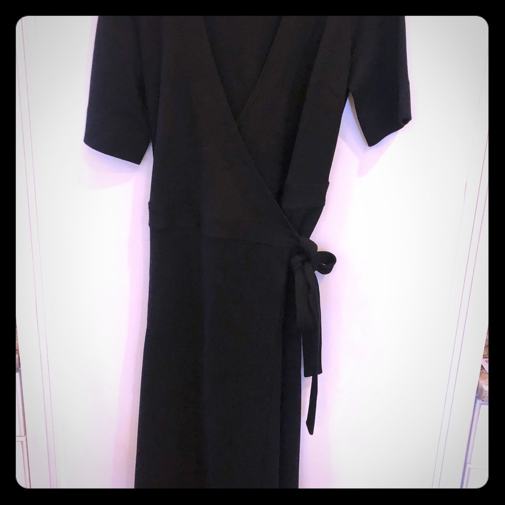 St John black wool knit classic wrap dress.